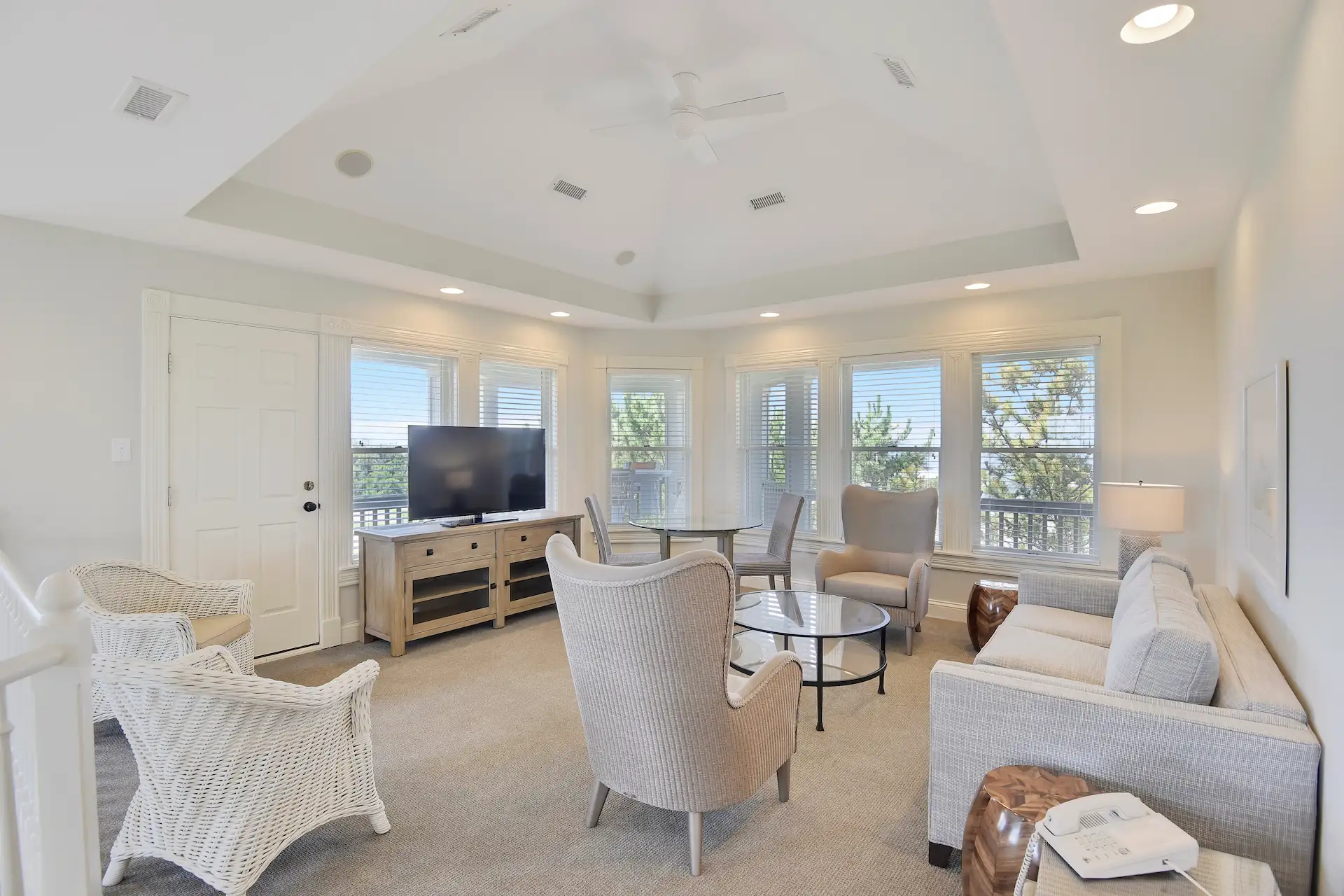 Spacious and bright living room in the Harris 3 Bedroom Residence, designed for relaxation and comfort