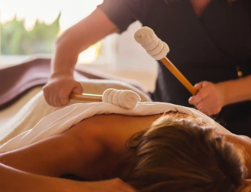 Resort 5 Woman enjoying a percussion massage at The Sanderling Hotel's spa