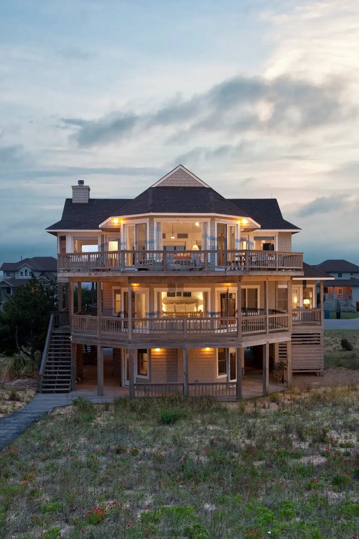 Resort 3 Front aerial view of Caffey House 6 Bedroom Residence at sunset.